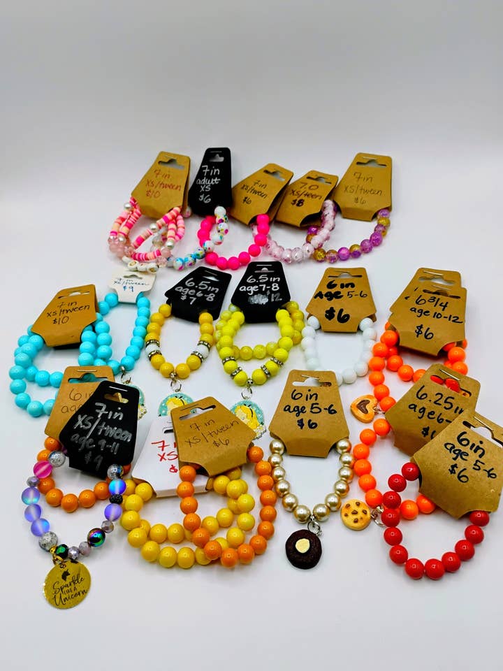 Kids lot 20+ pieces new condition beaded bracelets for wholesale by Swanky Lady Couture