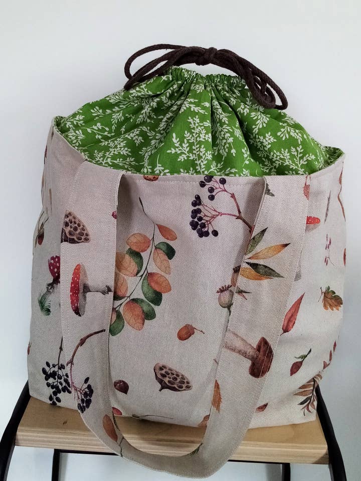 Borsa tote magica con pochette in tela e motivo foglie autunnali per la vendita all'ingrosso da parte di Esmée AccessoriesNco