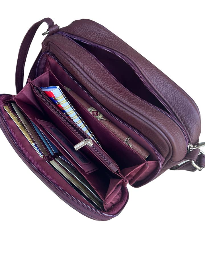 RM019A cowhide leather crossbody shoulder bag for wholesale by Roma Leathers, Inc.