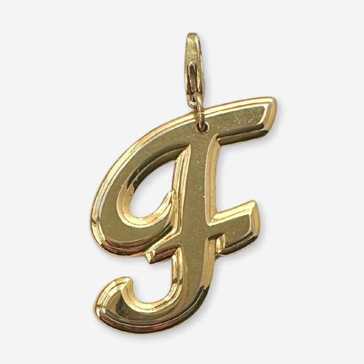 Large vintage shiny gold cursive "F" charm for wholesale by Lulu’s Petals