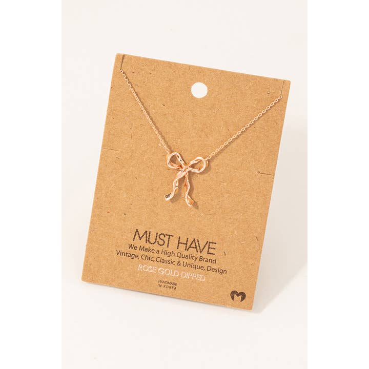 Fame Accessories - Wholesale Pendant/Charm Necklace - Gold Dipped Long Ribbon Bow Pendant Necklace