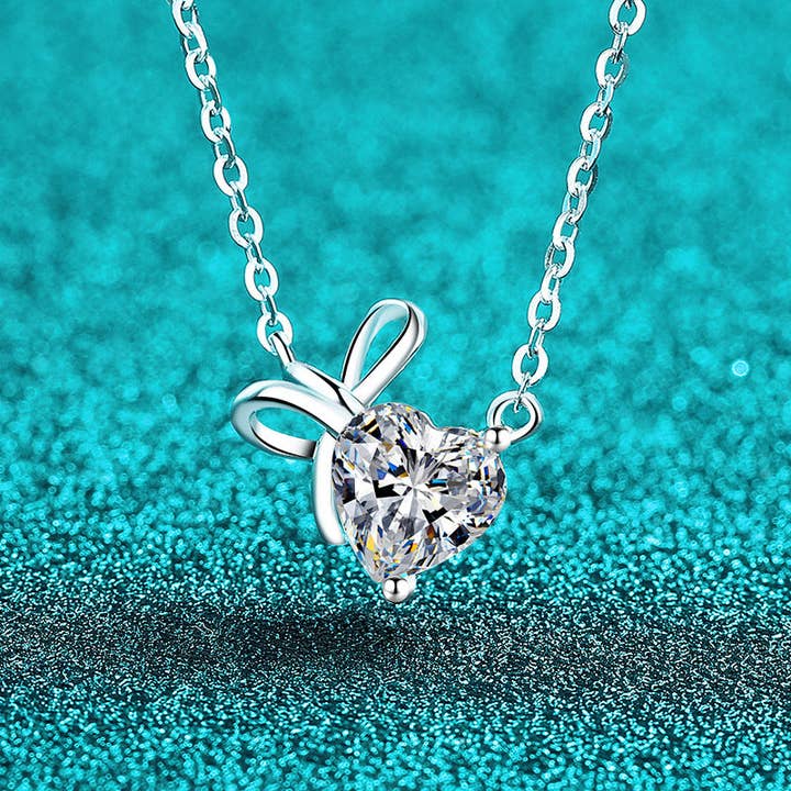 Heart Moissanite Bow Pendant Necklace in 925 Sterling Silver for wholesale by Perimade & Co. LLC