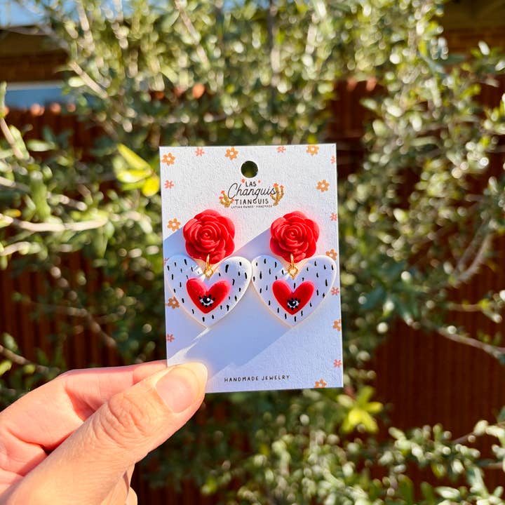 Pendientes de arcilla con ojo turco, corazón y rosa Milagrito para venta al por mayor de Las Changuis Tianguis