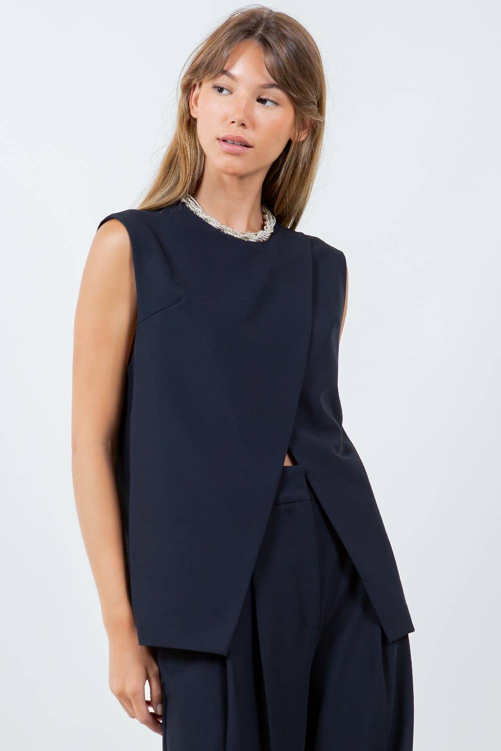 OVERLAP DETAILED WOVEN SLEEVELESS TOP - DK NAVY for wholesale on Faire1