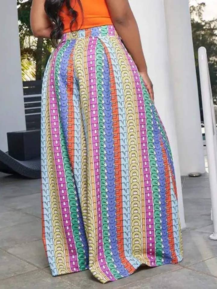 MULTICOLORE pantaloni larghi con dettaglio plissettato stampa lettere allover in vendita all'ingrosso su Faire
