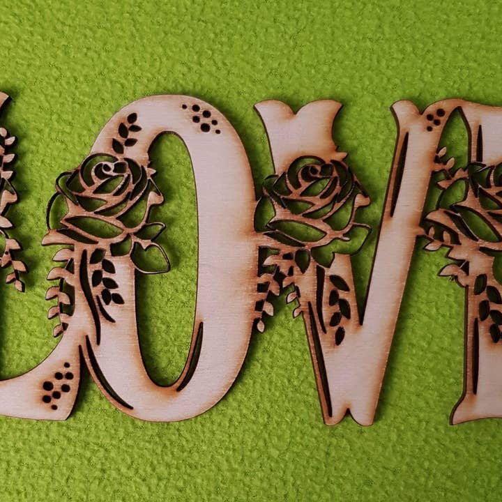 Beautiful Wooden wall decoration "Love" for wholesale by LaserCrafts IE