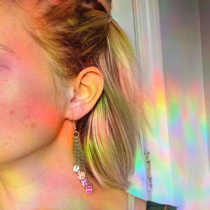 Subtle Edgy Pronoun Earrings for wholesale by Cottage Lvl Chaos