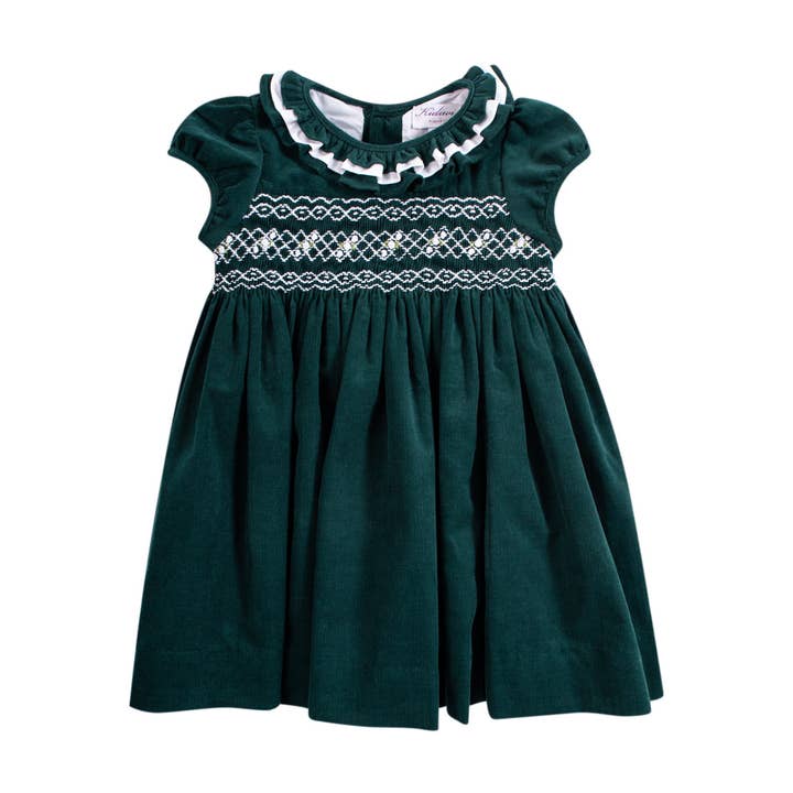 Vestido de veludo cotelê verde pinho com smock. Último tamanho 12M e outras tendências em Compre confecção roupa infantil B2B. Devoluções gratuitas e condições de pagamento a 60 dias na Faire na Faire.