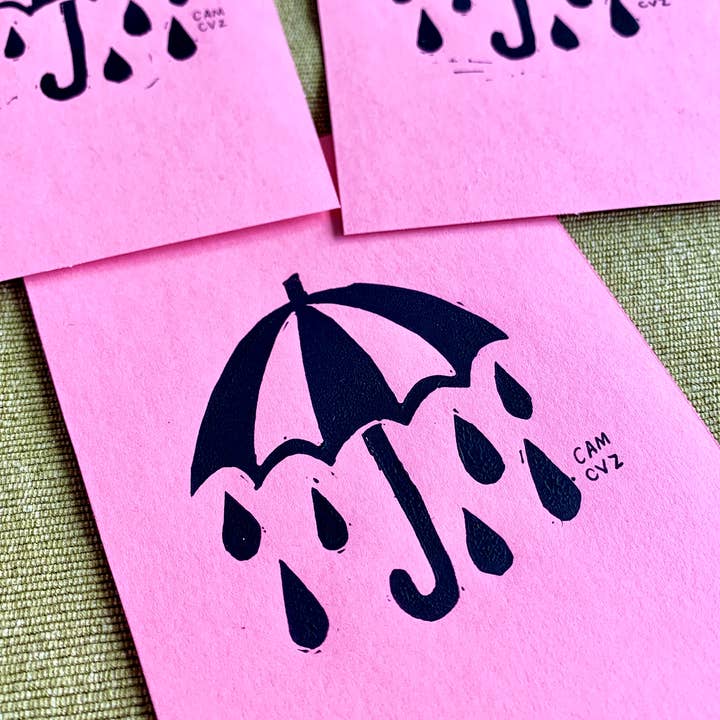 Parapluie, lot de 3 linogravures roses A6 | print artisanal pour la vente par Camille Cauvez illustration et papeterie