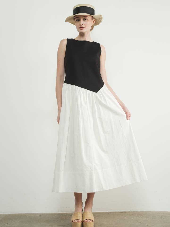 MAD3181 ASYMMETRISK MIDJA ÄRMLÖS MAXIKLÄNNING för wholesale av Aaron & Amber