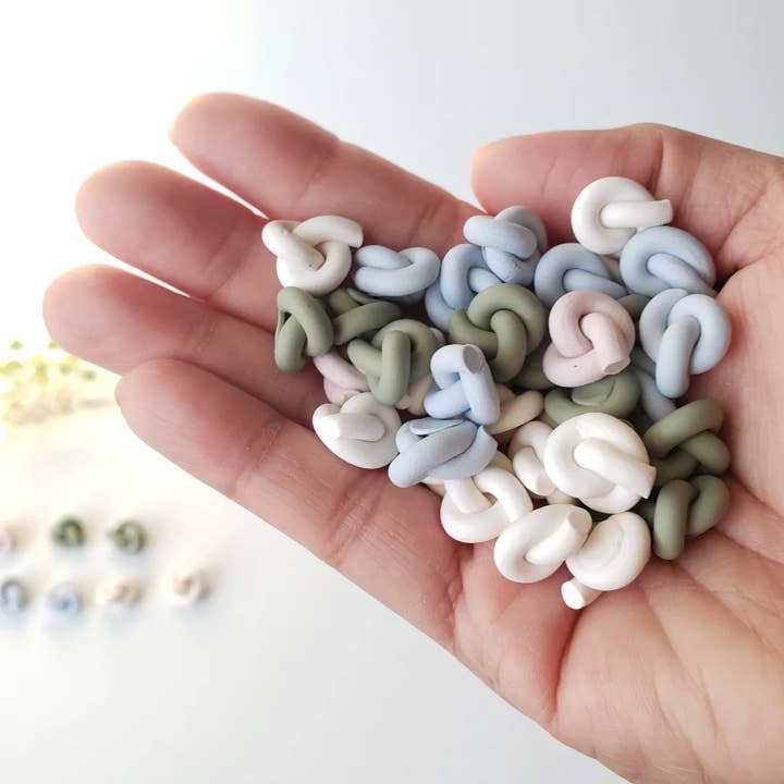 Forget Me Knots Studs for wholesale by Simply Chic