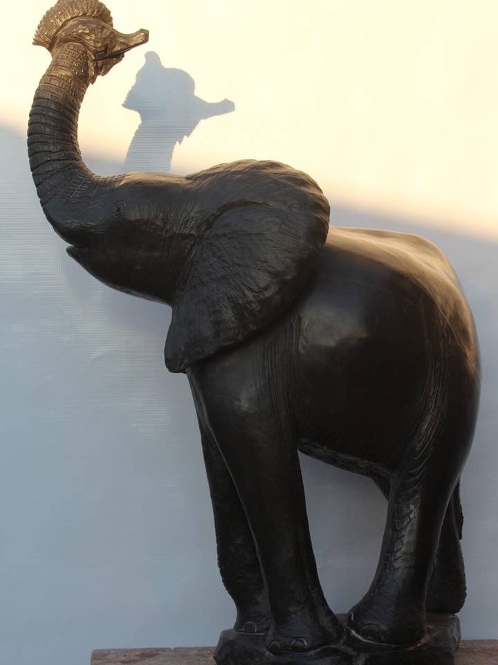 Trumpeting Elephant Stone Sculpture for wholesale by AVAC Arts
