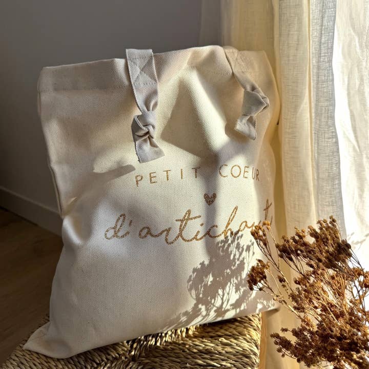 Borsa tote con nodi "Piccolo cuore di carciofo" écru per la vendita all'ingrosso da parte di Marcel & Lily