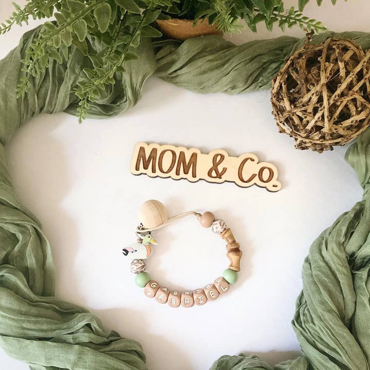 Mom & Co. - Vendita all'ingrosso Molletta per ciuccio - Neonati - Clip per ciuccio con richiamo per anatra germano reale2