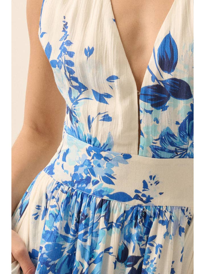 Off White Blue Plunging Neck Floral Woven Jumpsuit for wholesale on Faire4