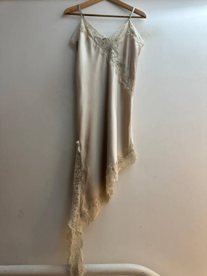 11221 Asymmetrical Short Strap Satin Dress and other Purchase Wholesale petticoat. Free Returns & Net 60 Terms on Faire trending on Faire.