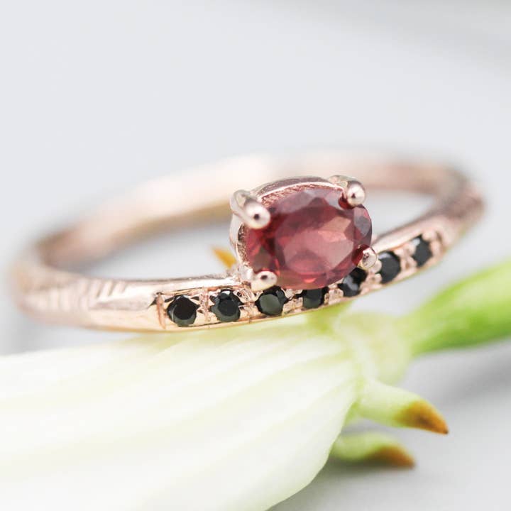Oval Garnet Ring with Black Spinel on 14k Rose Gold Band for wholesale by Metal Studio Jewelry