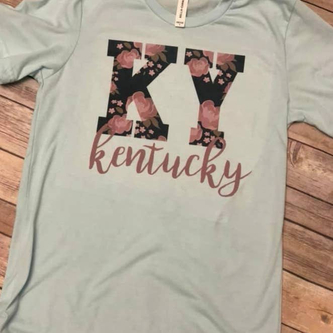 T-shirt Kentucky con motivo floreale per la vendita all'ingrosso da parte di Liberty Thredz