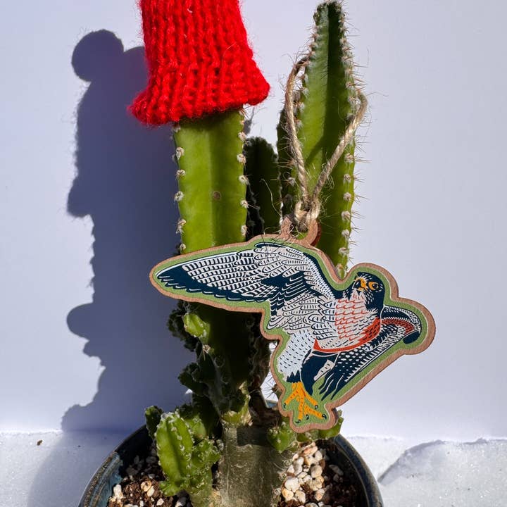 Falcon Wooden Ornament for wholesale by Caroline Clark
