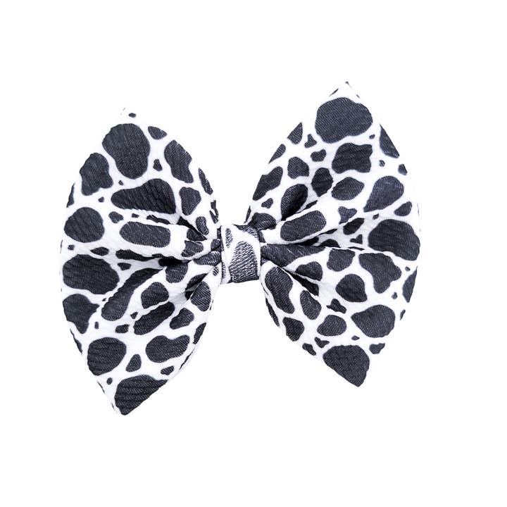 Sophia Hair Bow - Cow Print for wholesale by Caylee & Co