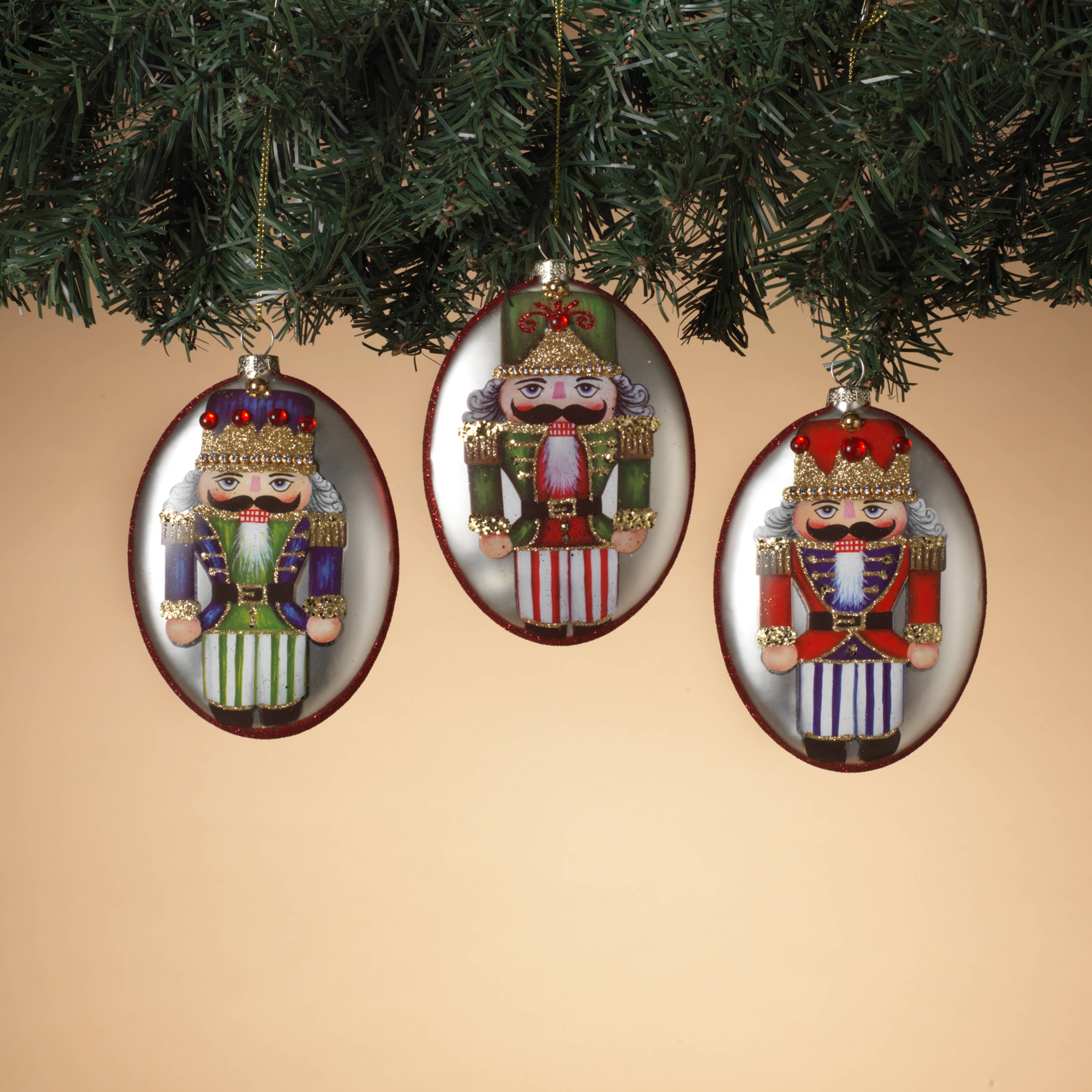 The Gerson Companies - Wholesale Christmas Decoration - Gerson Christmas 5.25"H Glass Oval Disc Nutcracker Ornament,0