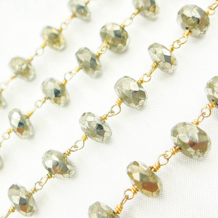 Tresor Jewelry Inc. - Wholesale Beaded Bracelet - Pyrite Rondel Faceted Gold Plated Wire Chain. PYR543