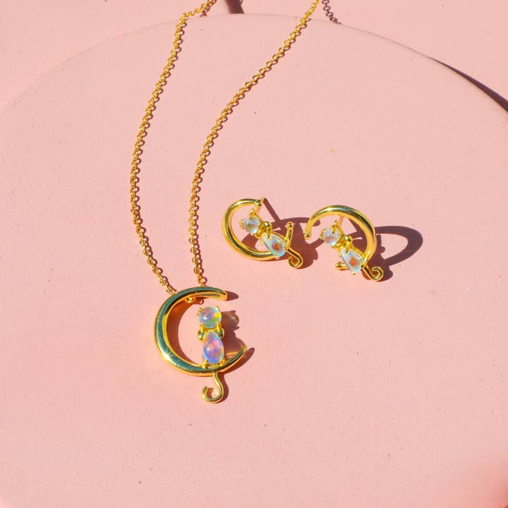 Katze am Monduntergang für den Großhandel von MiniDes