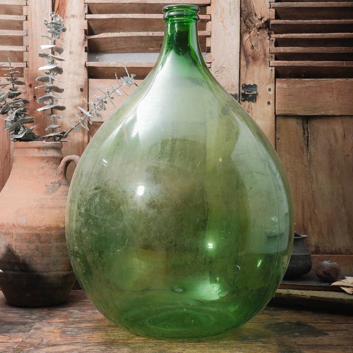 Oversized Green Glass Demijohn Bottle and other Purchase wholesale tall glass bottles. Free returns & net 60 terms on Faire trending on Faire.