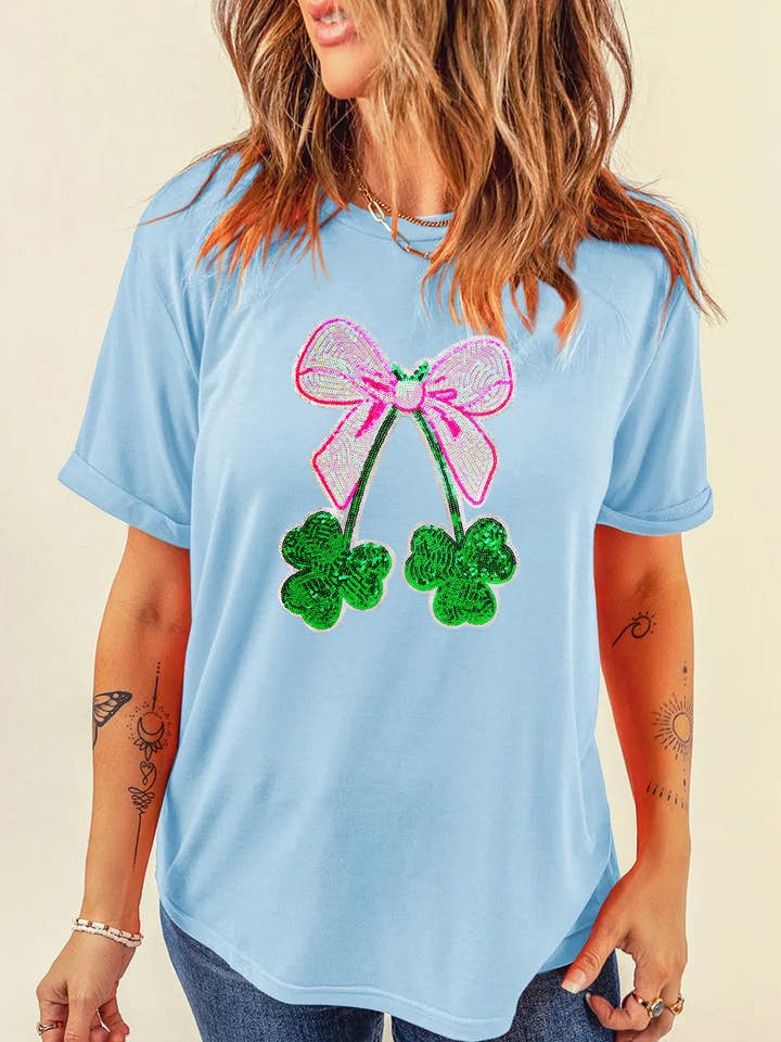 T-shirt graphique avec nœud et trèfle pour la Saint-Patrick pour la vente par Lovesoft
