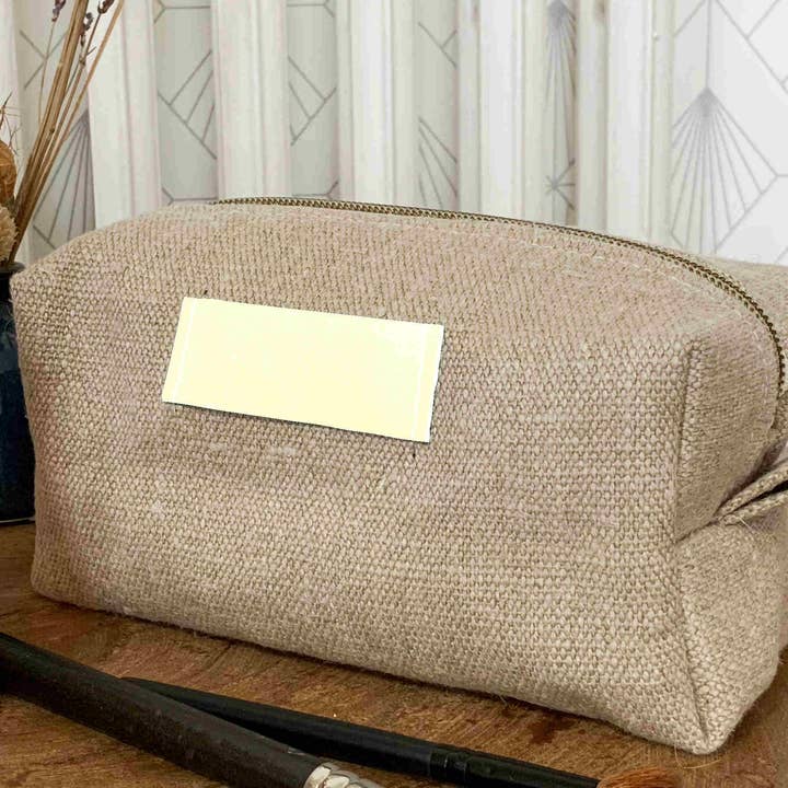 Wochenend-Kulturbeutel aus naturbelassenem Hanf mit cremeweißem Leder für den Großhandel von Fossette