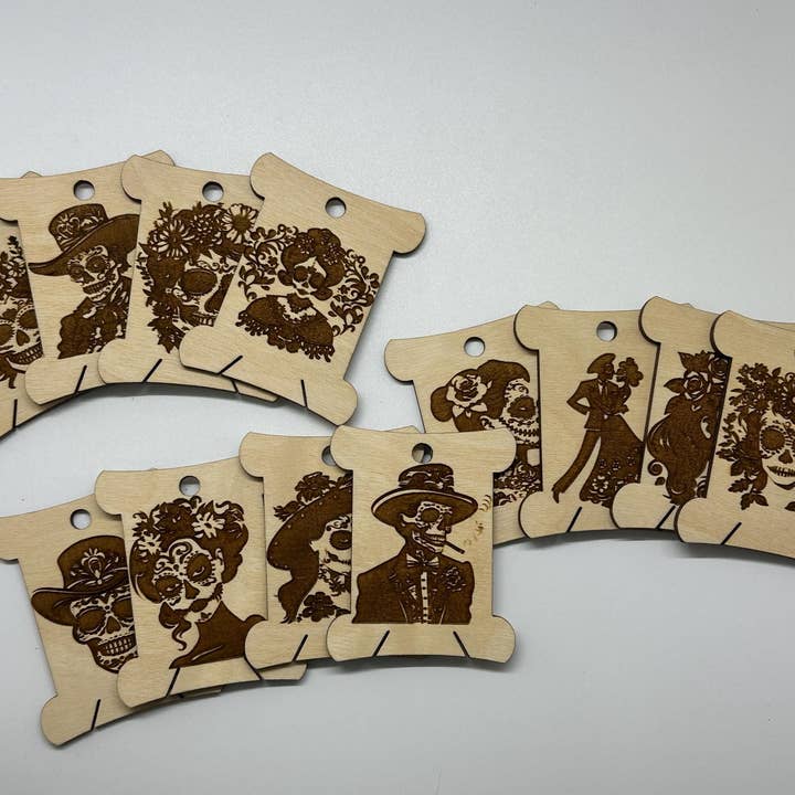 Velvet Guillotine - Wholesale Embroidery/cross-stitch supplies - Sugar Skull Wooden Bobbins: Laser Engraved Floss Organizer1