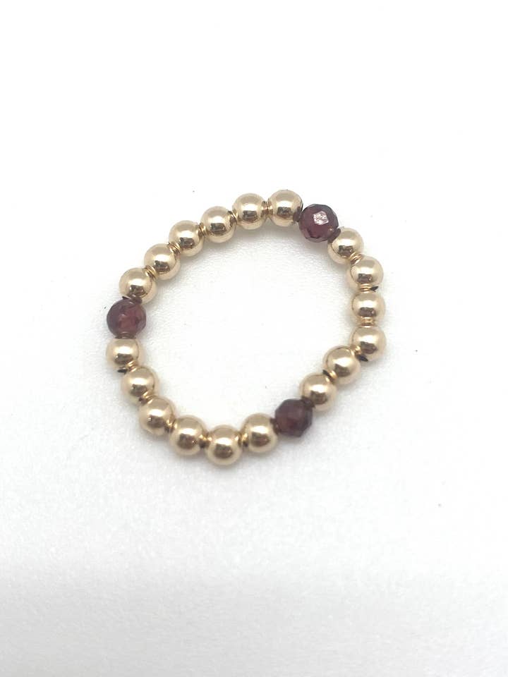 Pippi ring - gold/garnet for wholesale by In2 design