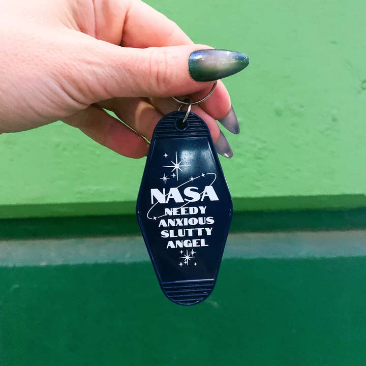 NASA Needy Anxious Slutty Angel Space Explorer Keychain for wholesale by GetBullish