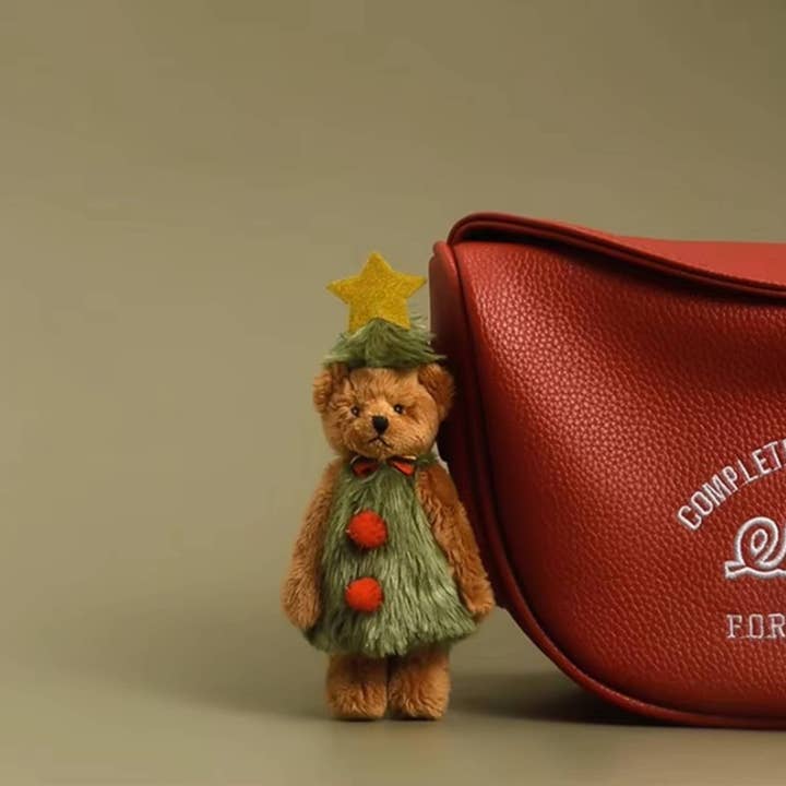 Weihnachtlicher Plüschbär als Schlüsselanhänger für den Großhandel von Buddha Yoga