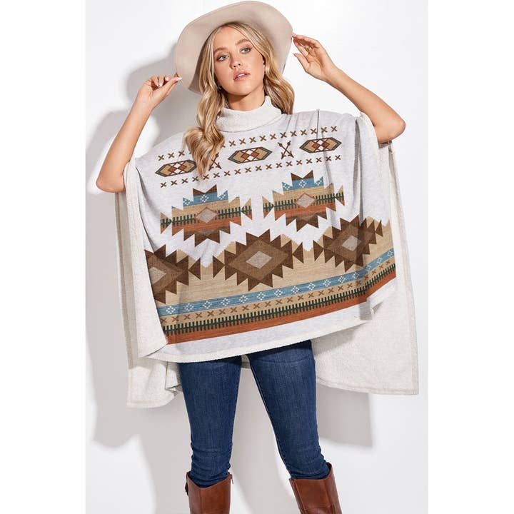 Aztec print turtle neck poncho for wholesale by Phil Love