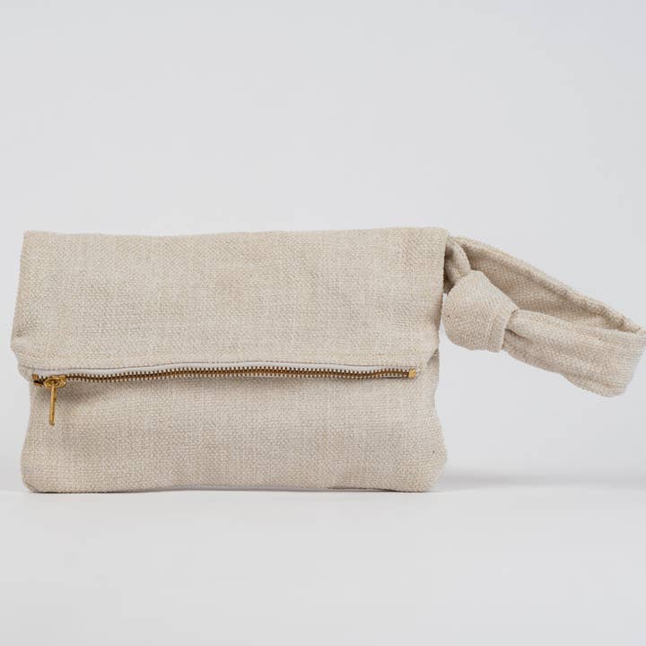 Cream Clutch for wholesale by New Hope Girls