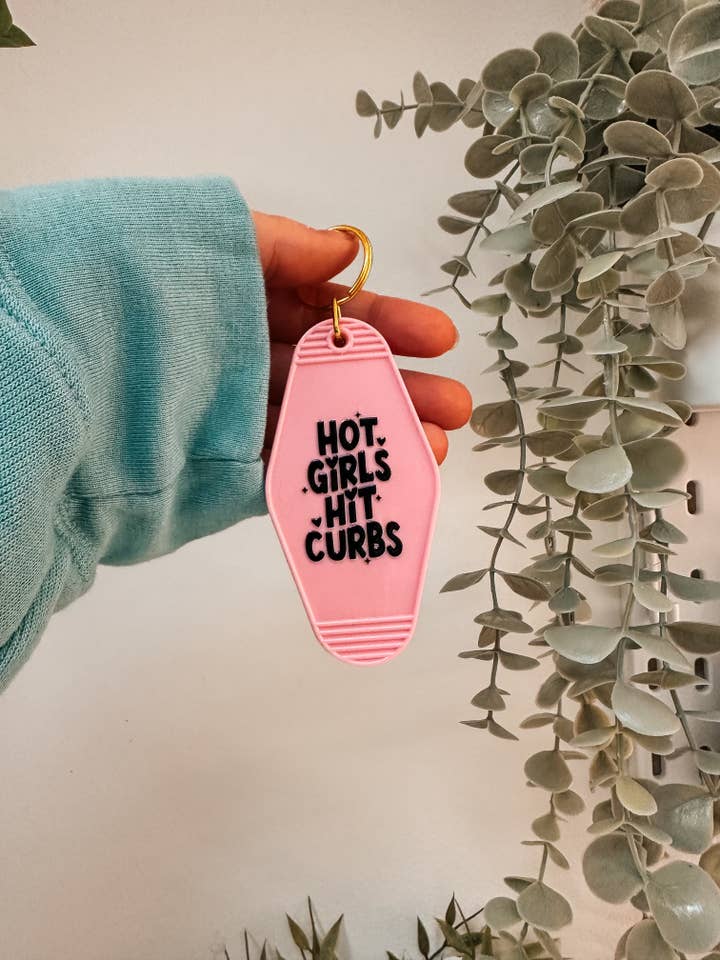 Hot Girls Hit Curbs Keychain for wholesale by Powered By Daisies
