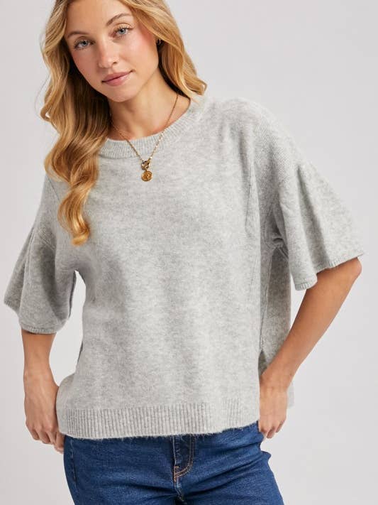 Haut en maille à manches courtes et amples pour la vente par Pink Irene Wholesale