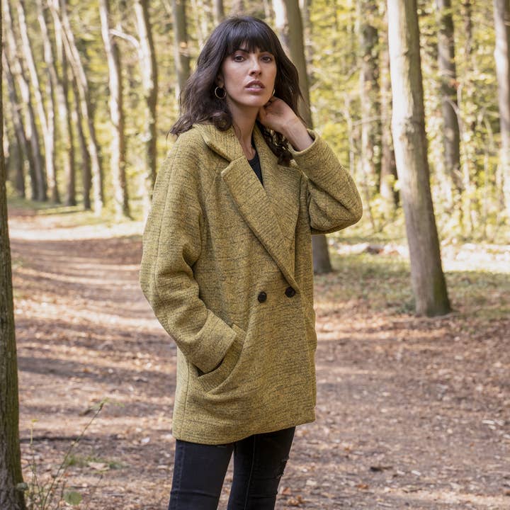 Økologisk frakke i gule Osmose plastflasker for engroshandel hos MAGNETHIK