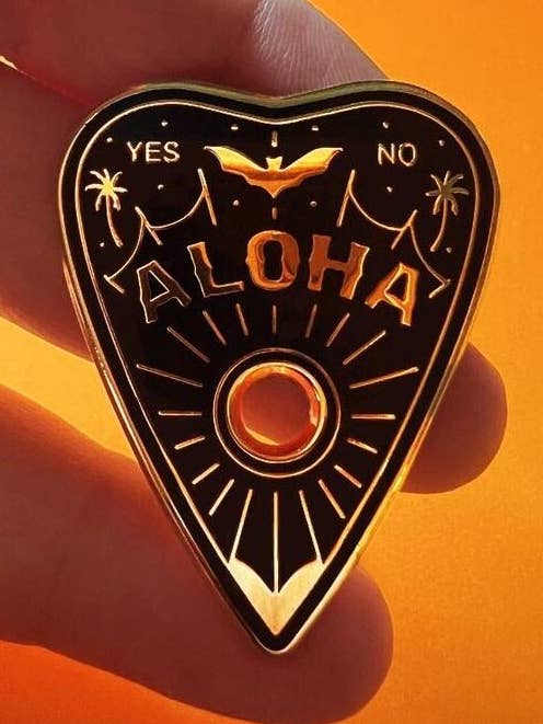 Summerween Pin, Gold Halloween Tiki Planchette, Ouija Aloha for wholesale by Carrie Anne Hudson Art