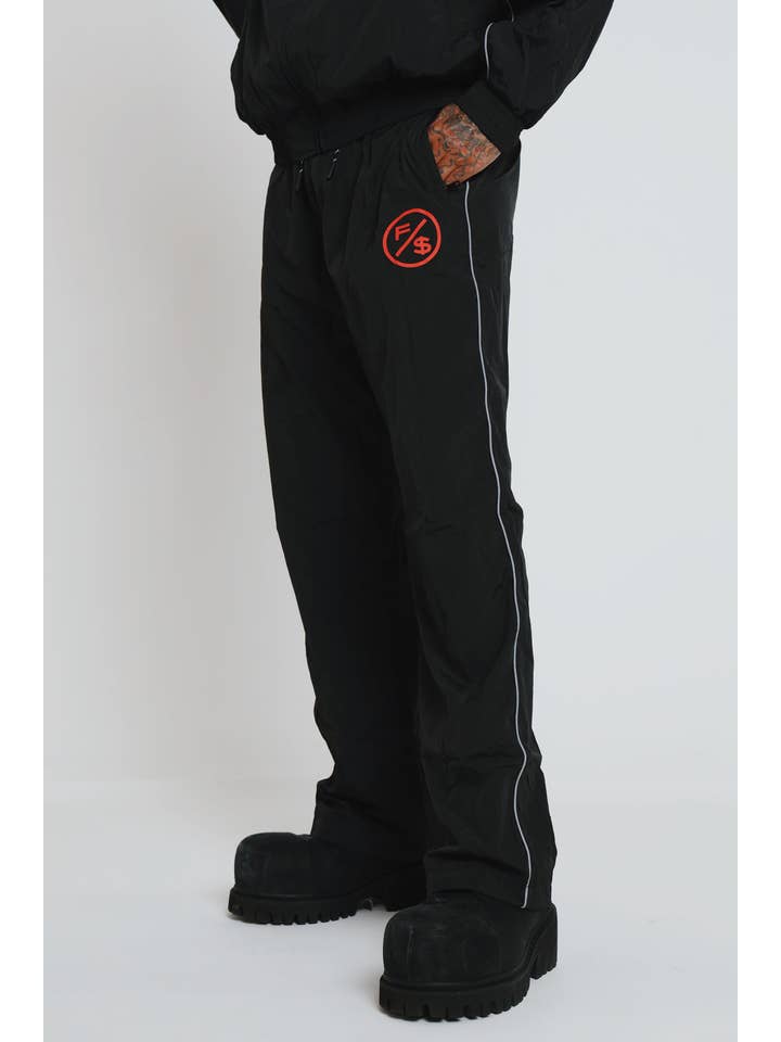 Black Red MOTION Nylon Pants (BRED) for wholesale on Faire11