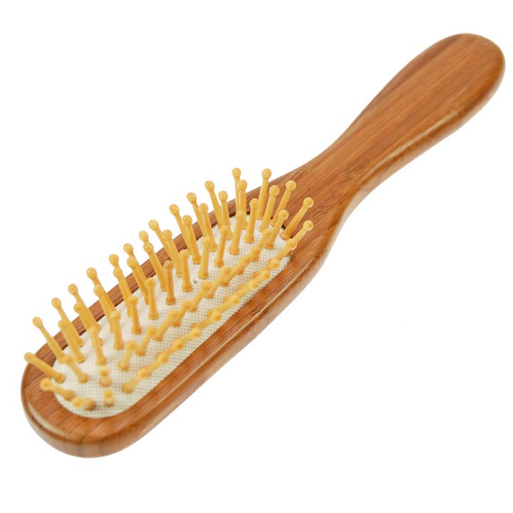 Bamboo wooden hairbrush, size 21 x 4 cm for wholesale by Fantasia R. Espig KG