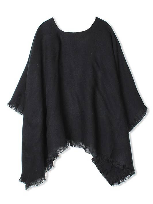 Poncho à franges pour la vente par Suzie Q USA
