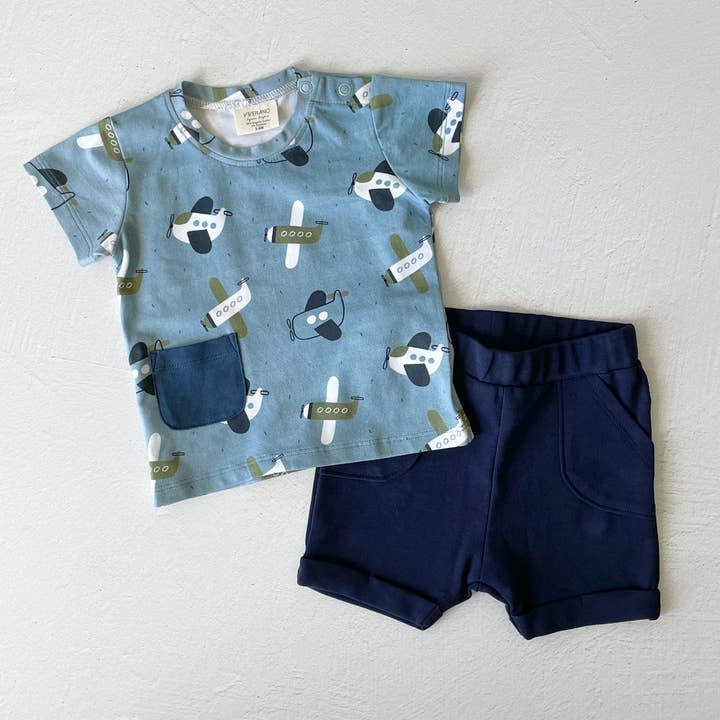 Blue Airplanes Baby Pocket Tee + Shorts Set (Organic Jersey) for wholesale on Faire