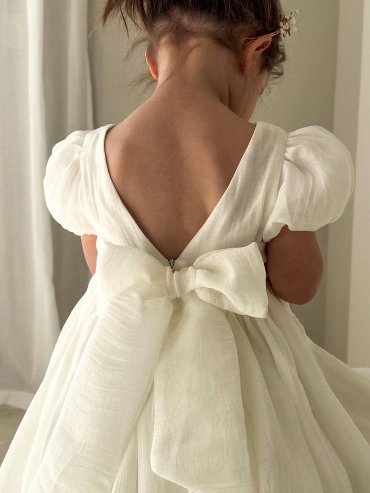 Delia Ivory Baby Dress for wholesale by A Little Lacey