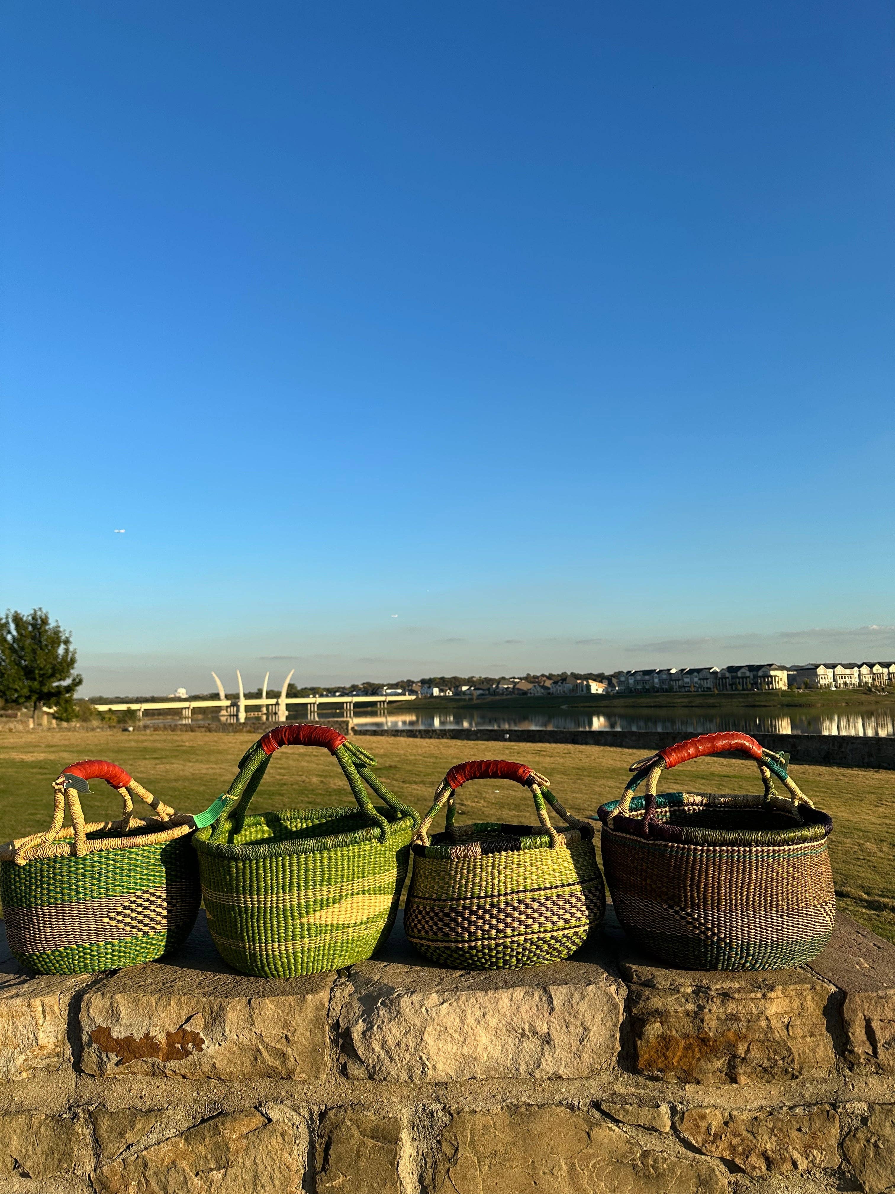 The African Home Goods - Wholesale Basket - Round Bolga Market Basket w/ Leather Wrapped Handle - Green Assorted 1 EA