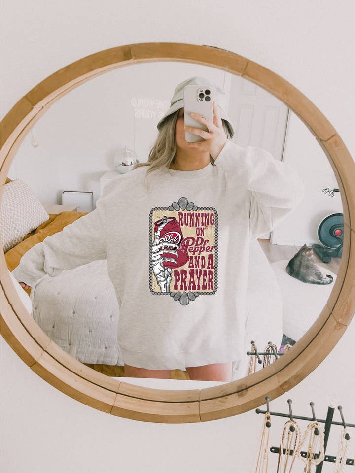 Running on DP & a prayer tee or sweatshirt for wholesale by Gunpowder and lace wholesale