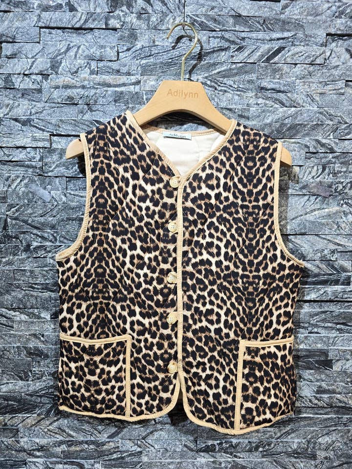 Quilted sleeveless leopard jacket, buttons 30651 for wholesale by Adilynn