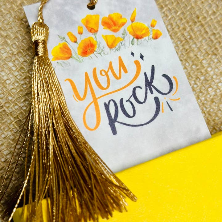 Segnalibro You Rock (2x6 pezzi in lino con nappa dorata) per la vendita all'ingrosso da parte di Jenuine Heartfelt Design