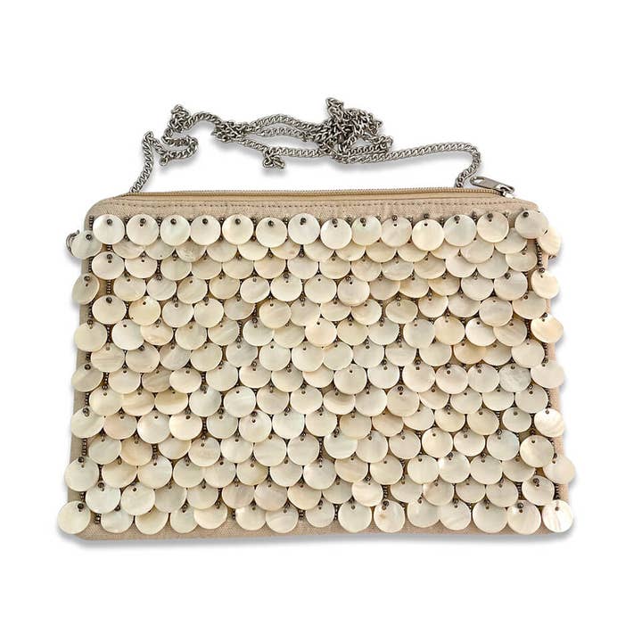 Layered Shell Clutch and other Purchase Wholesale capiz shells with holes. Free Returns & Net 60 Terms on Faire trending on Faire.